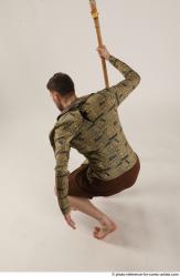 KEETA KNEELING POSE WITH SPEAR